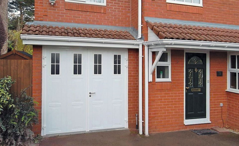 Side hinged garage doors